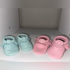 Pink and blue freshly picked moccasins for newborns